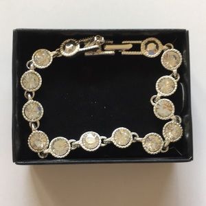 AVON silvertone tennis bracelet